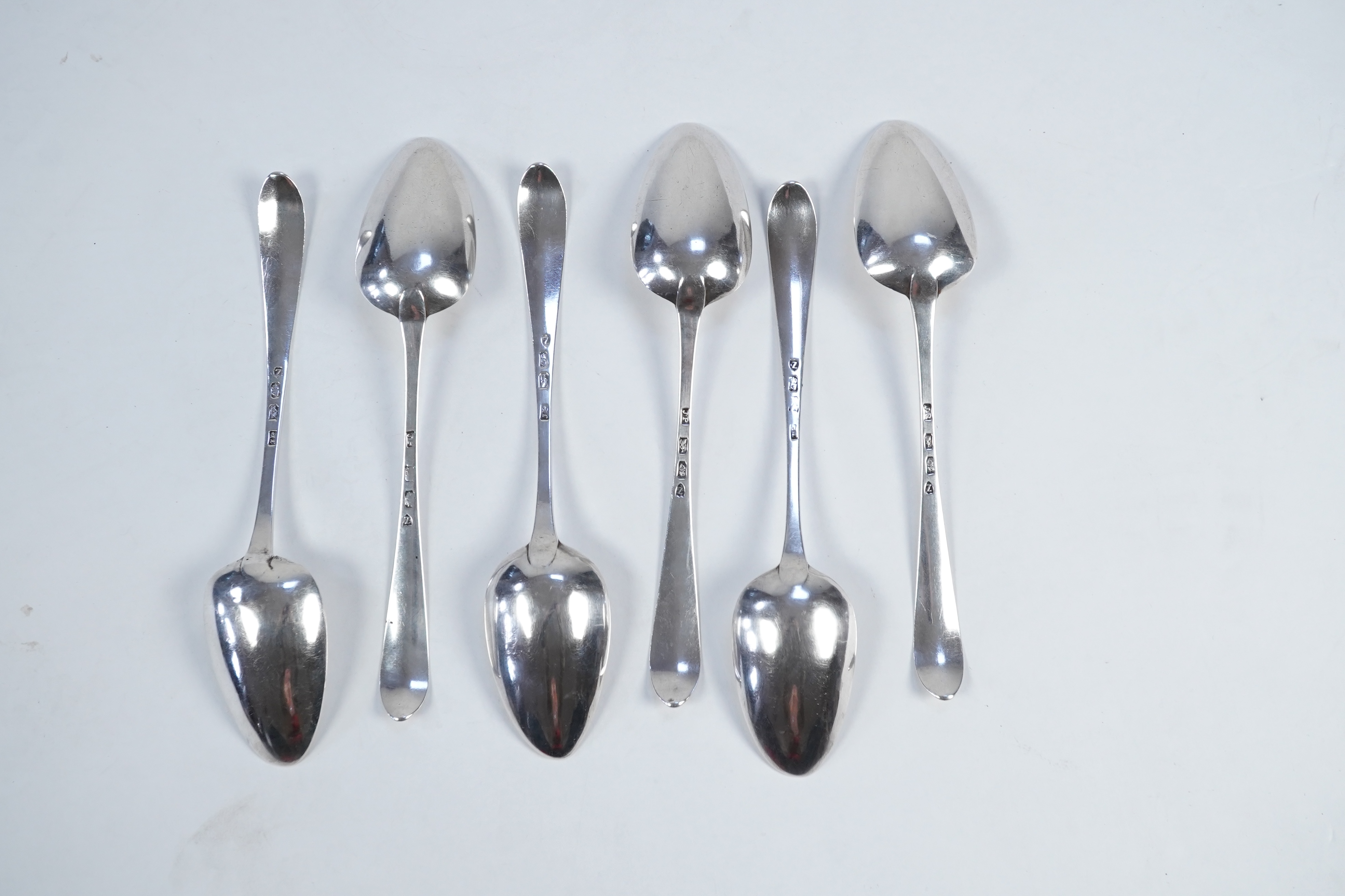 A set of six George III Irish silver bright cut engraved serving/table spoons by John Pittar